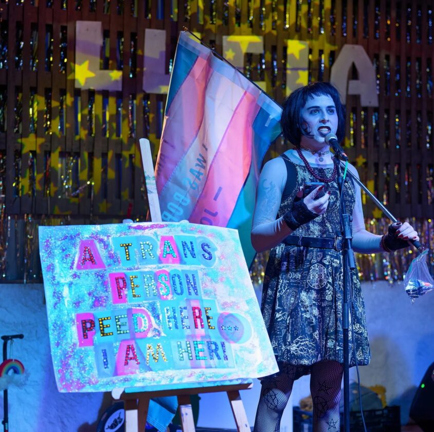 Supporters rally for transgender KU custodian reported for bathroom use under new law